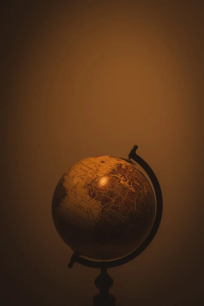Vintage globe lit warmly (Incomplete: max_output_tokens)